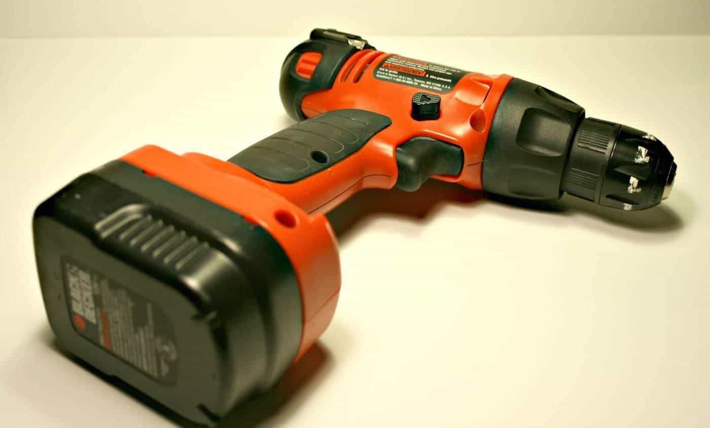 A cordless drill on a white background